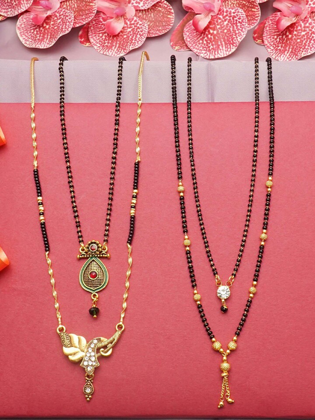

Ramdev Art Fashion Jwellery Set Of 4 Gold-Plated Stones-Studded & Beaded Mangalsutra