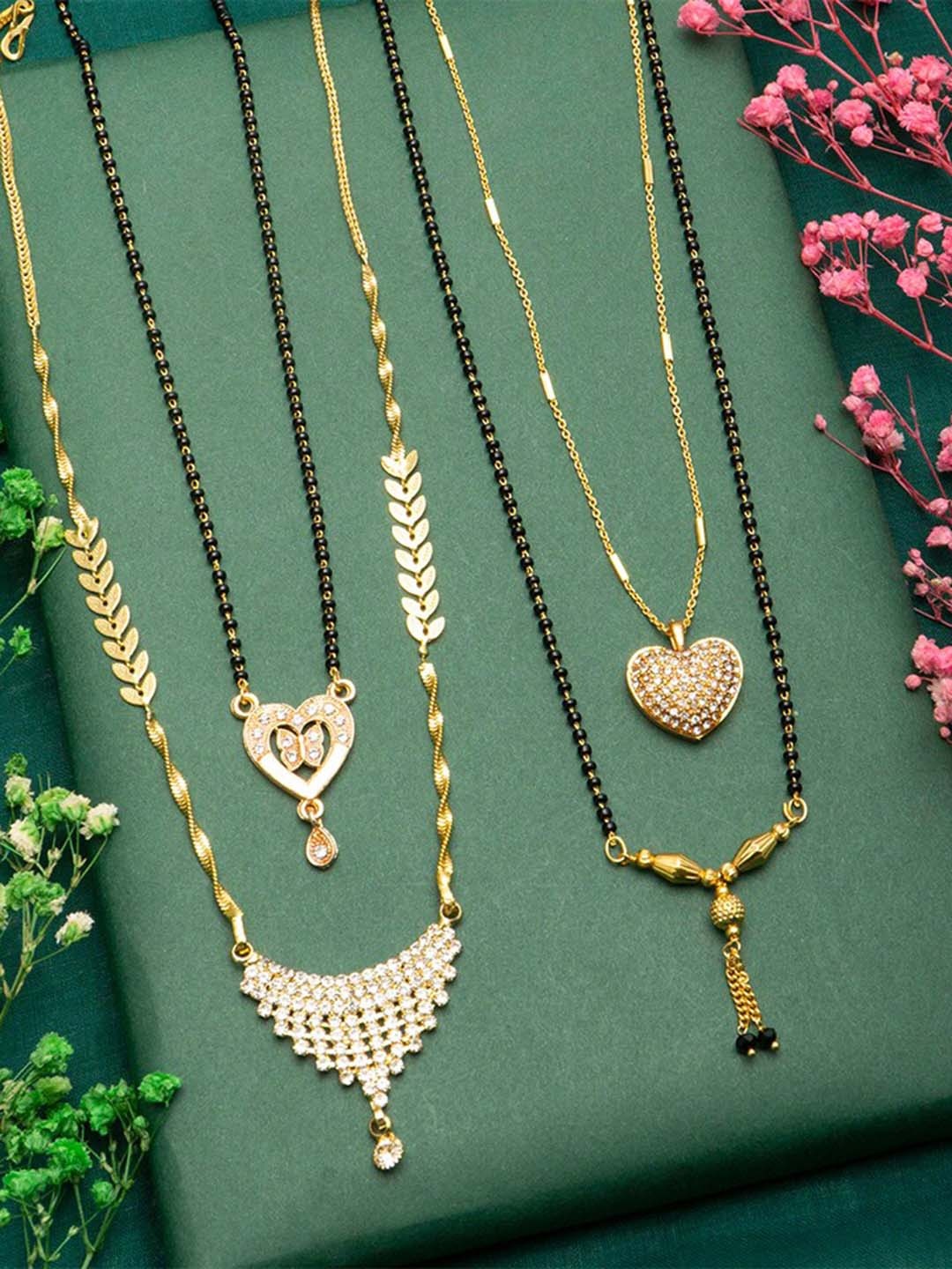 

Ramdev Art Fashion Jwellery Set Of 4 Gold Plated Stones Studded & Beaded Mangalsutra