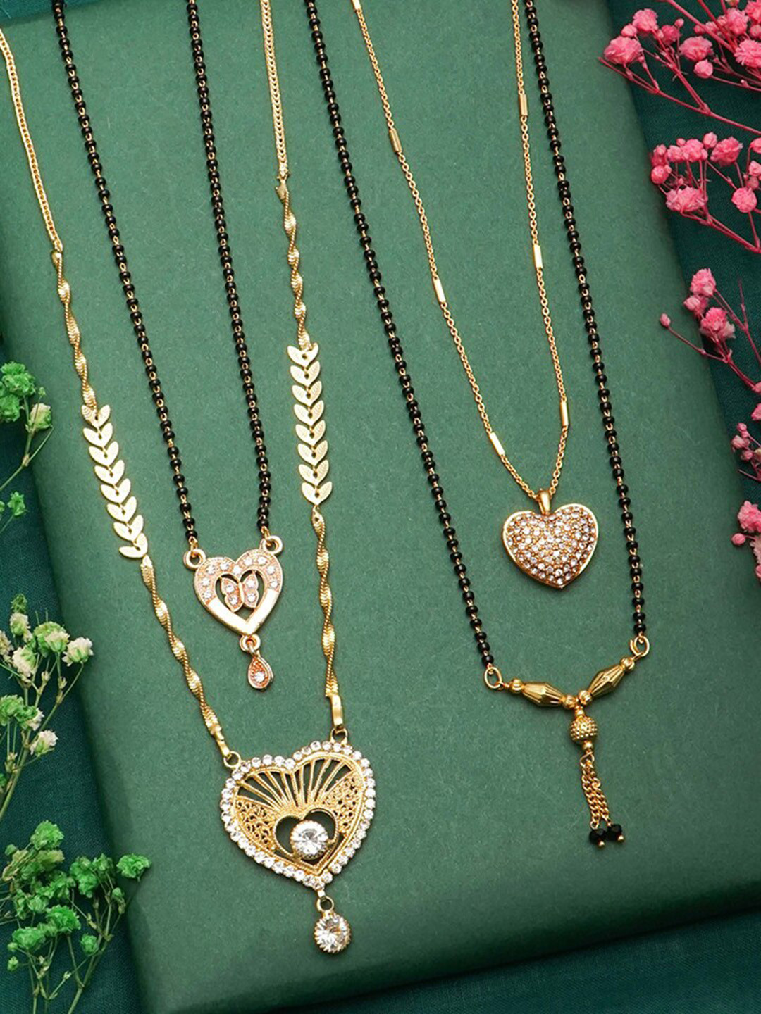 

Ramdev Art Fashion Jwellery Set of 4 Gold Plated Mangalsutra