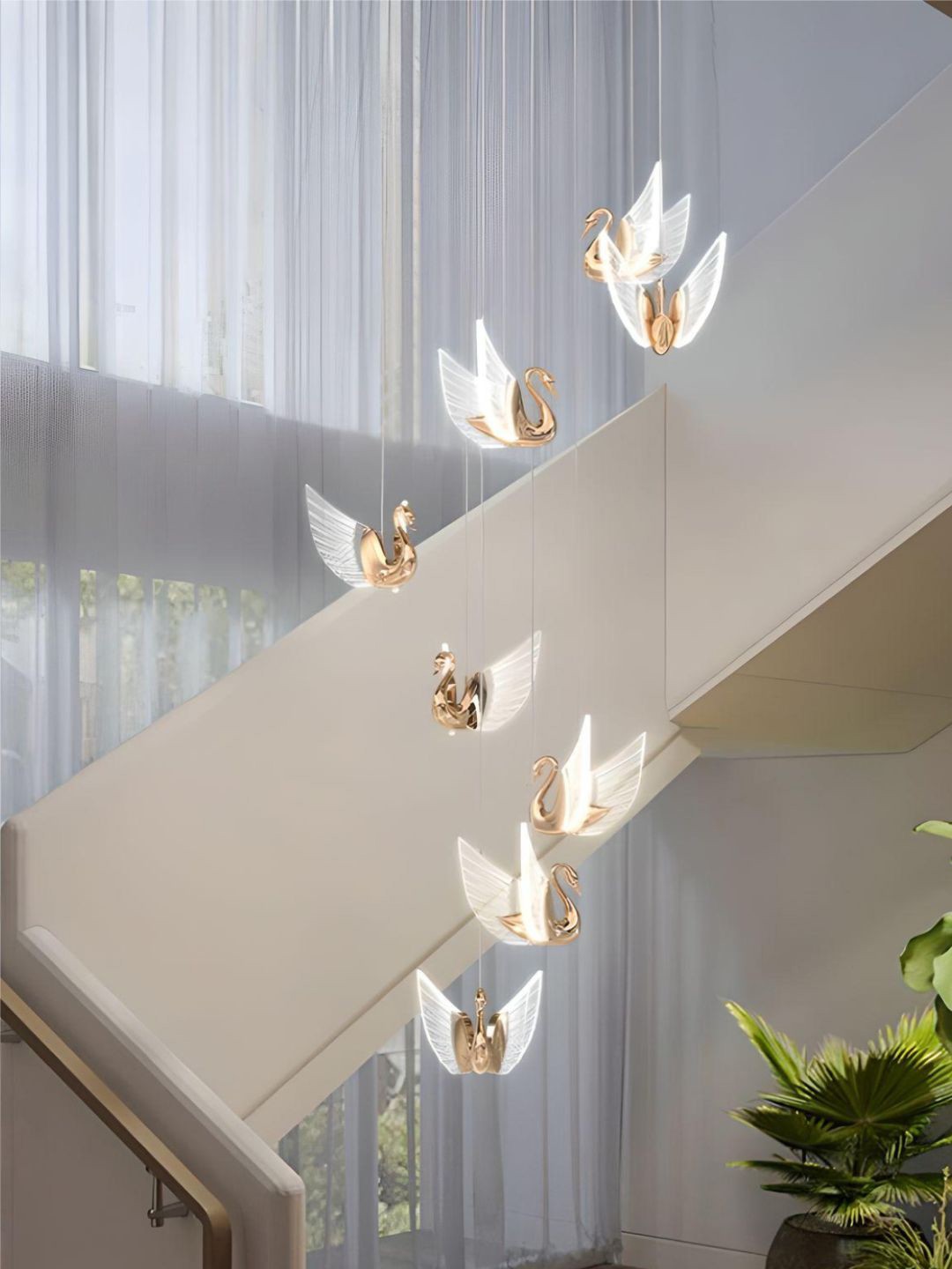 

The Art House Golden & White 8-Light LED Swan Hanging Ceiling Lamps
