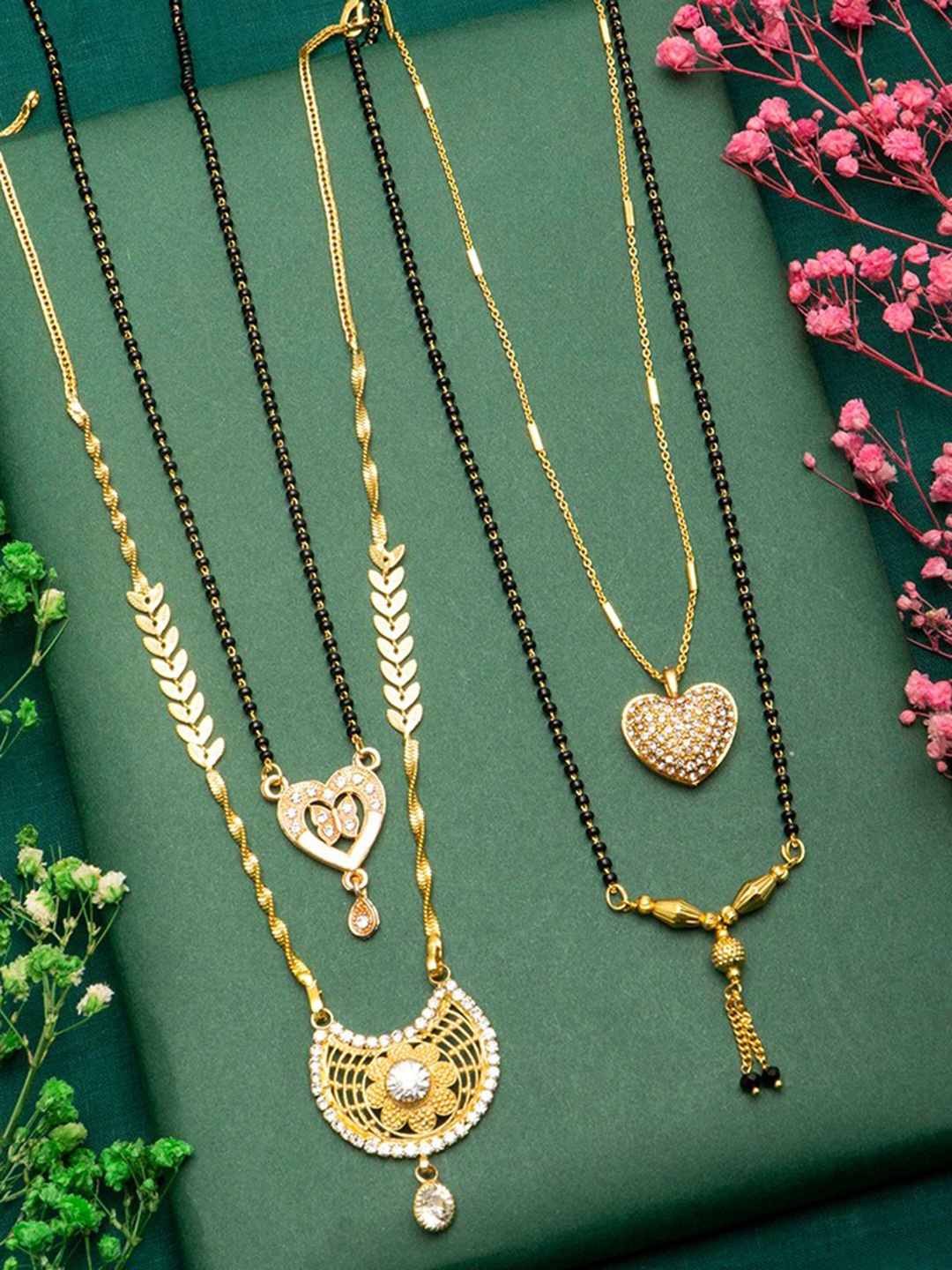 

Ramdev Art Fashion Jwellery Set of 4 Gold Plated Mangalsutra