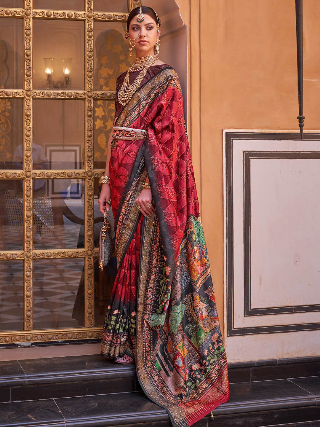

Anouk Maroon Ethnic Motifs Printed Banarasi Saree