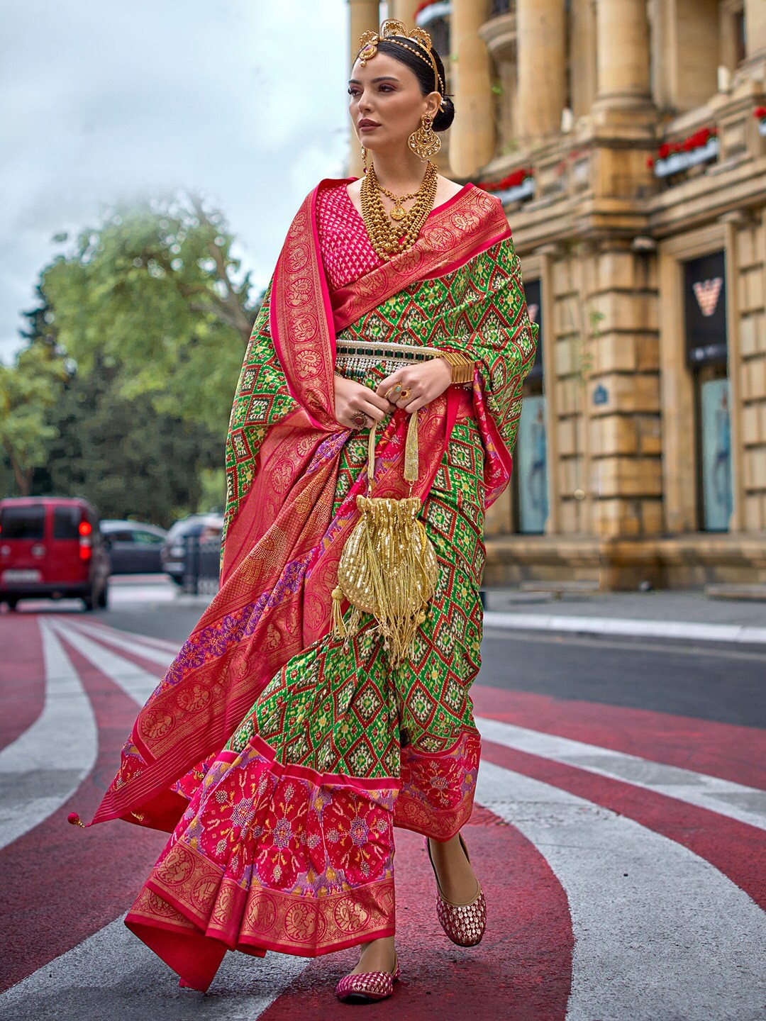 

Anouk Green & Pink Ethnic Motifs Printed Zari Patola Saree