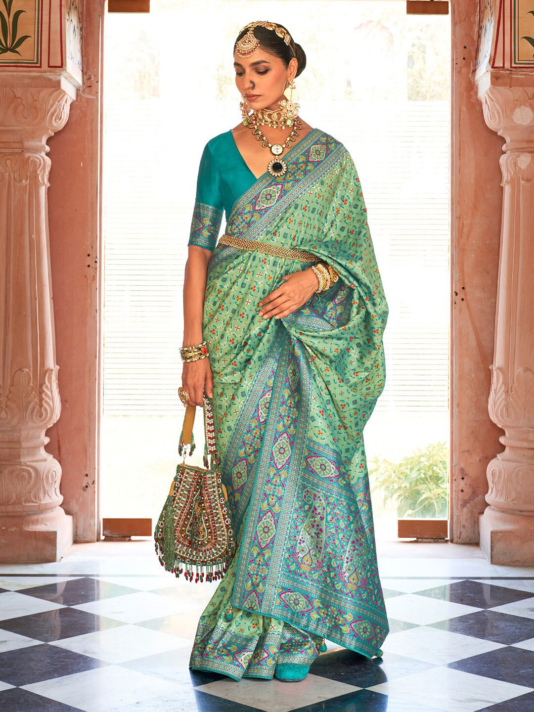 

Anouk Sea Green & Pink Ethnic Motifs Woven Design Zari Silk Blend Kanjeevaram Saree