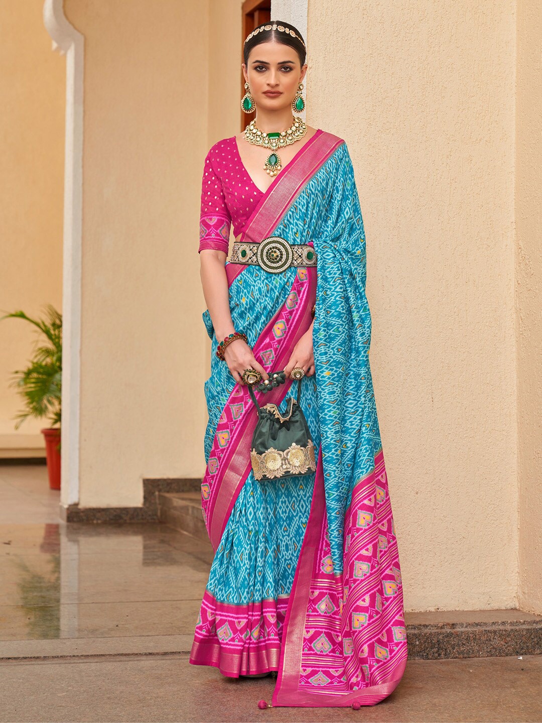 

Anouk Blue & Pink Ethnic Motifs Printed Zari Silk Blend Patola Saree