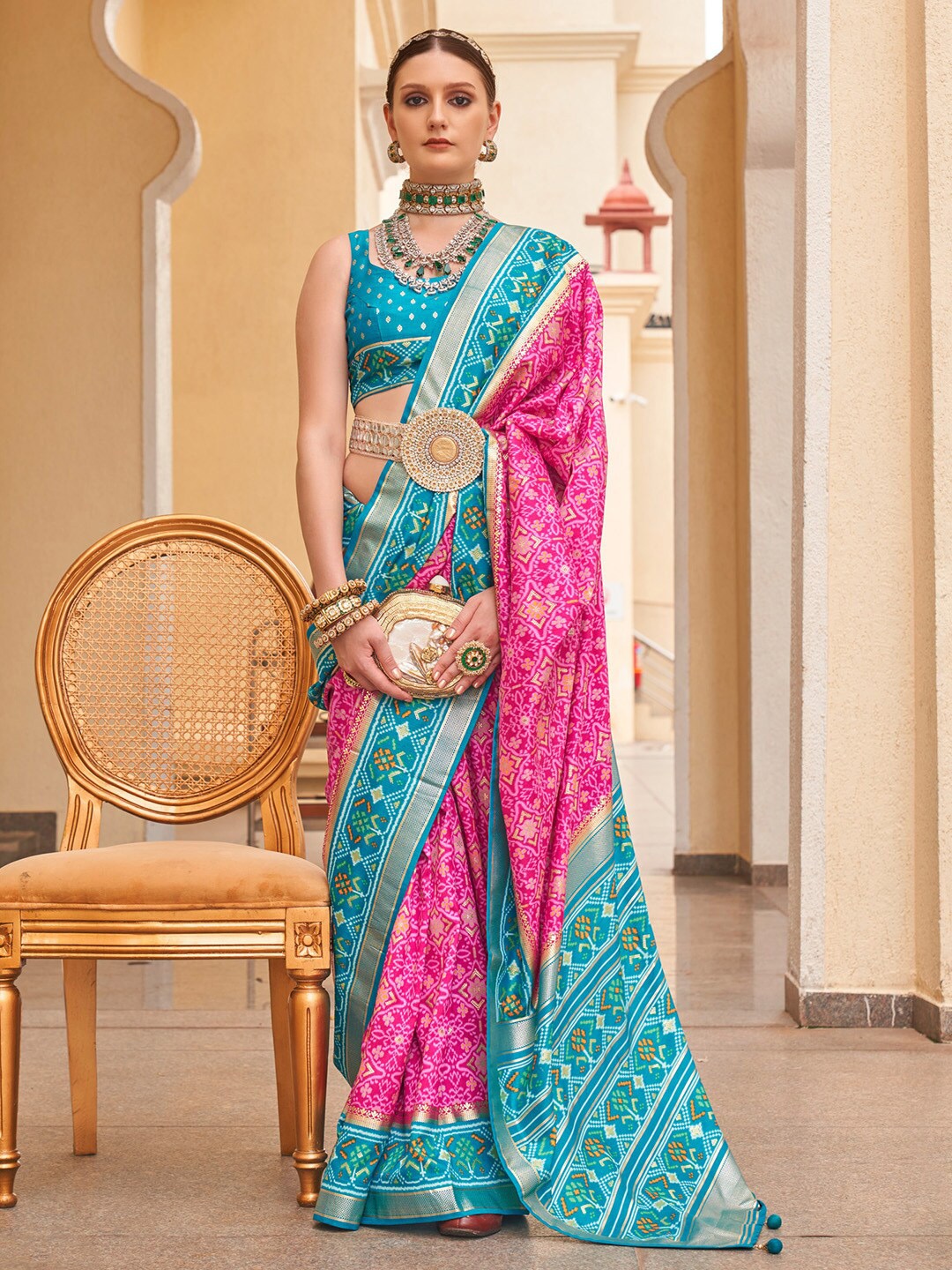 

Anouk Pink & Blue Ethnic Motifs Printed Zari Patola Saree