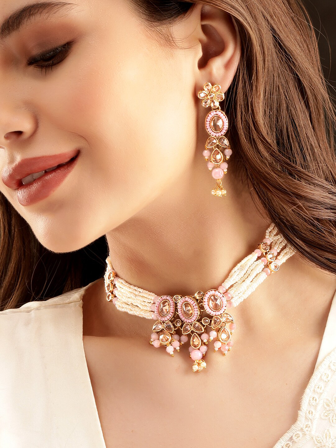 

Rubans Gold Plated American Diamond Studded & Beaded Jewellery Set