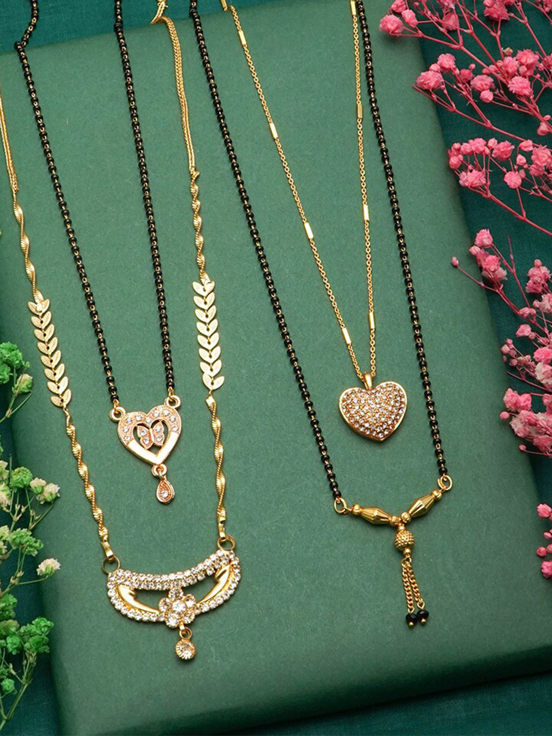 

Ramdev Art Fashion Jwellery Set of 4 Gold Plated Mangalsutra