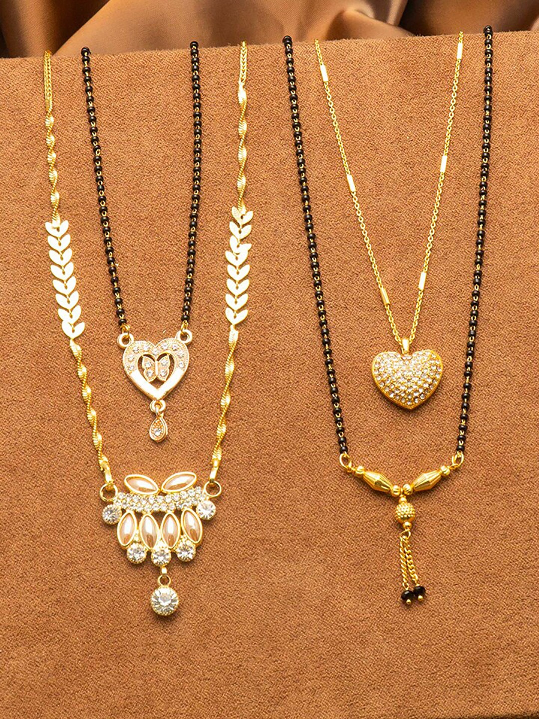 

Ramdev Art Fashion Jwellery Set of 4 Gold Plated Mangalsutra