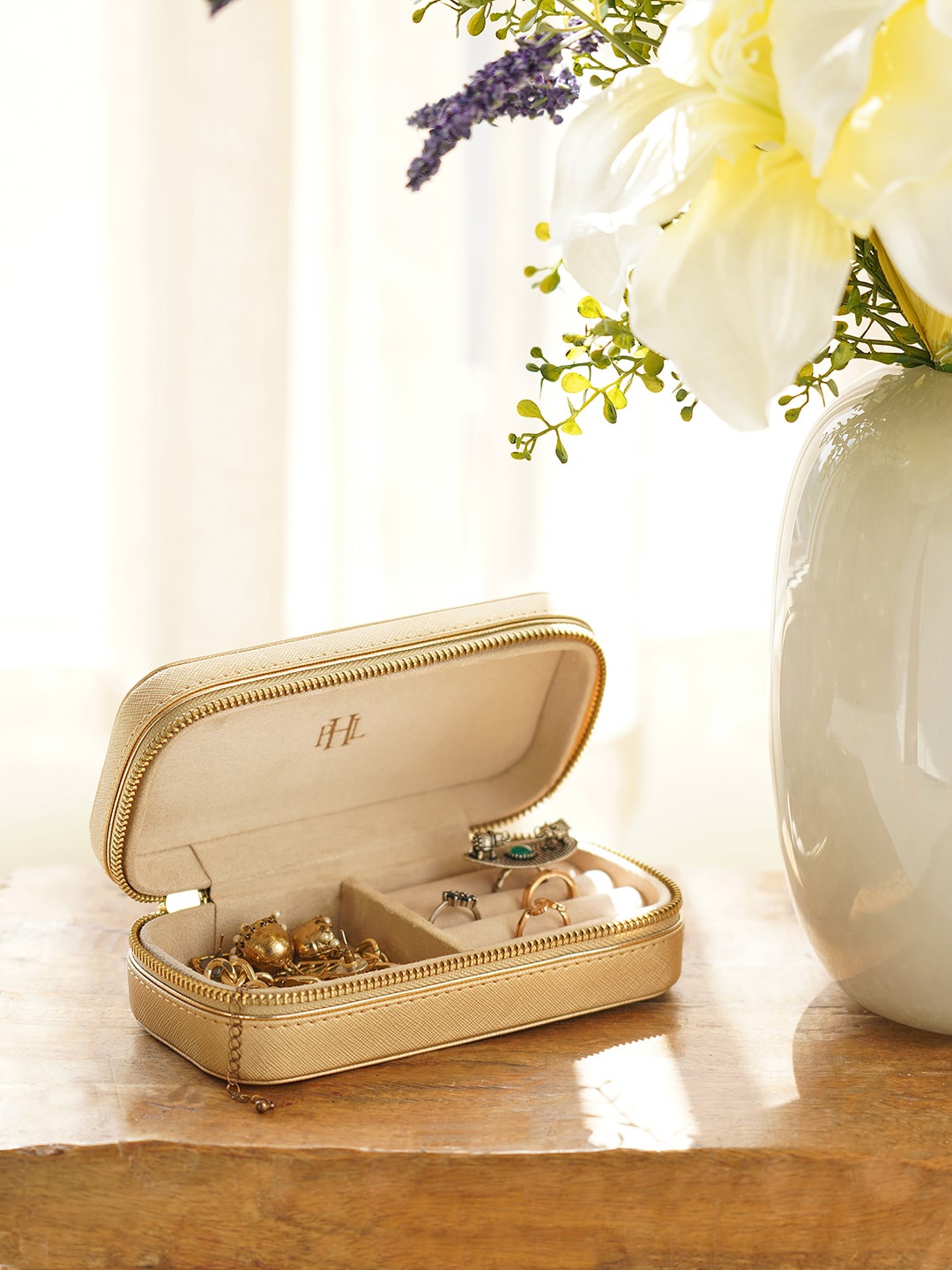 

Pure Home and Living Beige Self Design Faux Leather Travel Jewellery Box