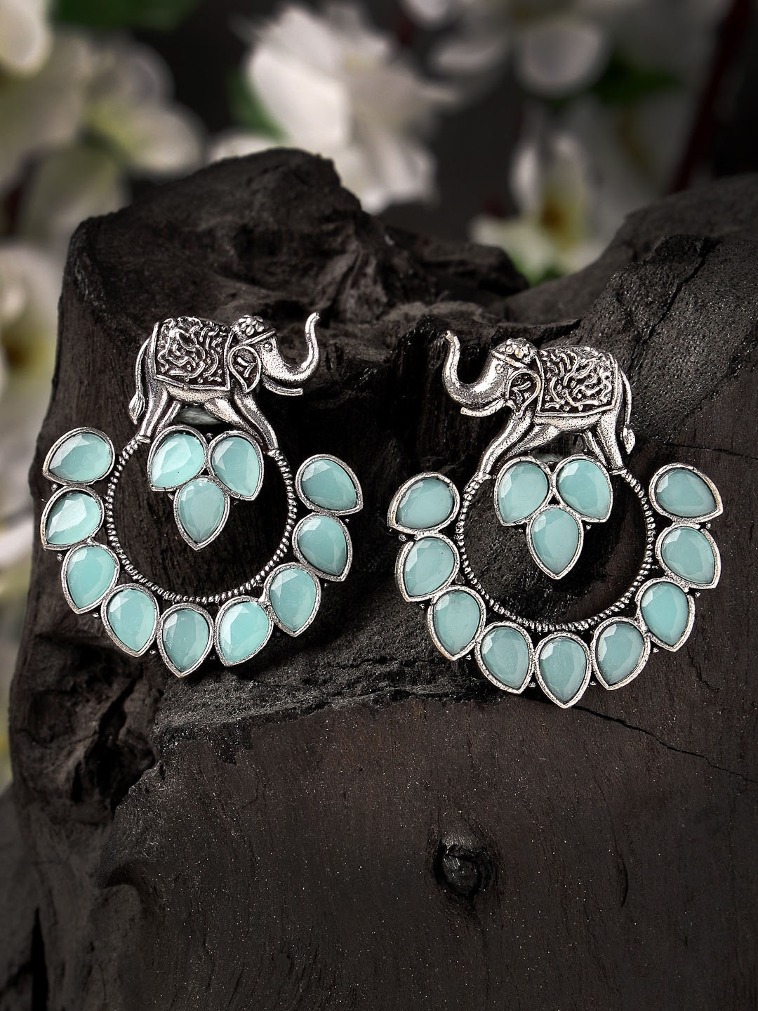 

Sanjog German Silver Oxidized Stone Studded Drop Elephant Sea Blue Earrings