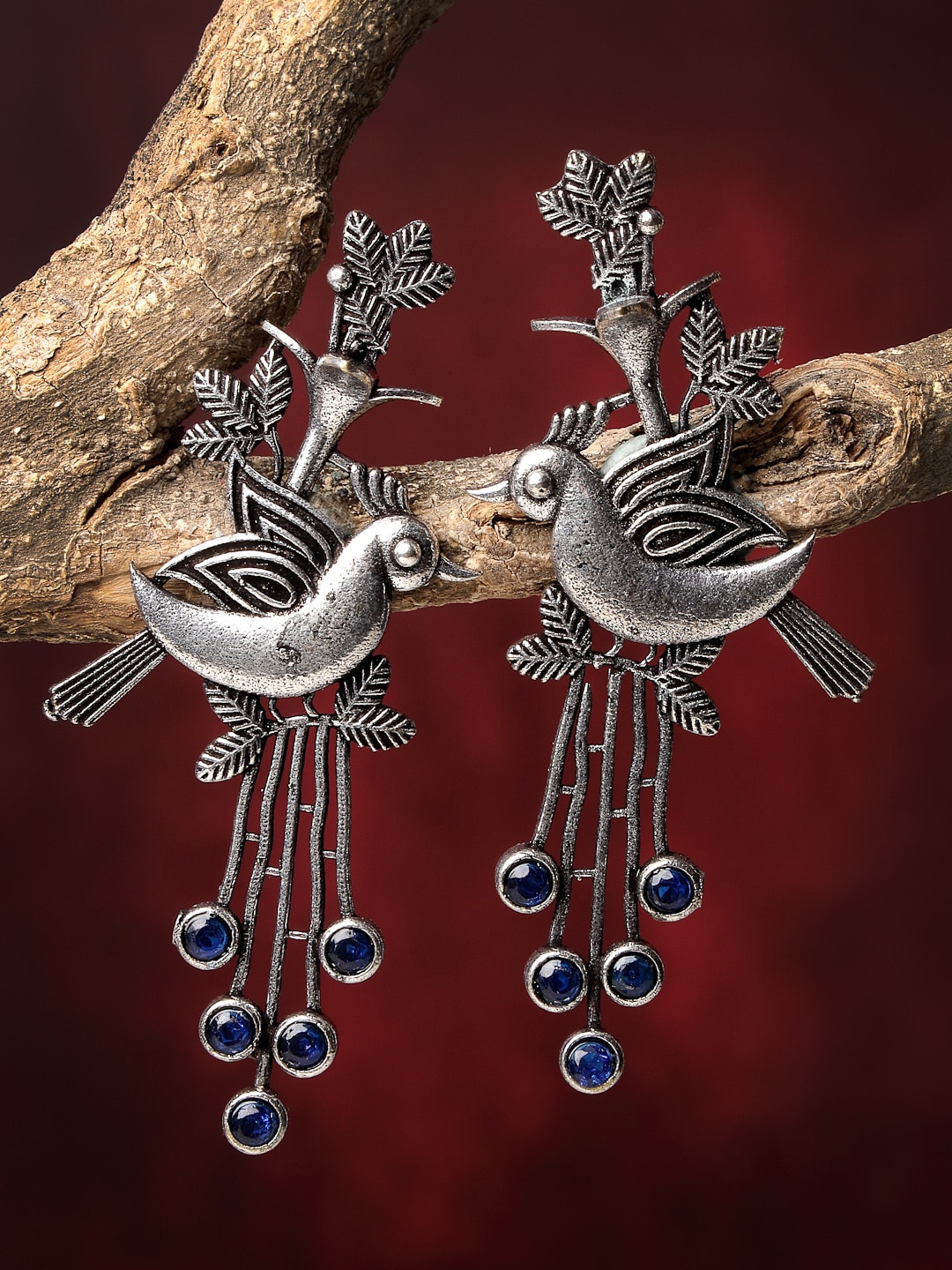 

Sanjog Oxidized Silver-Plated Stone-Studded Contemporary Drop Bird Earrings