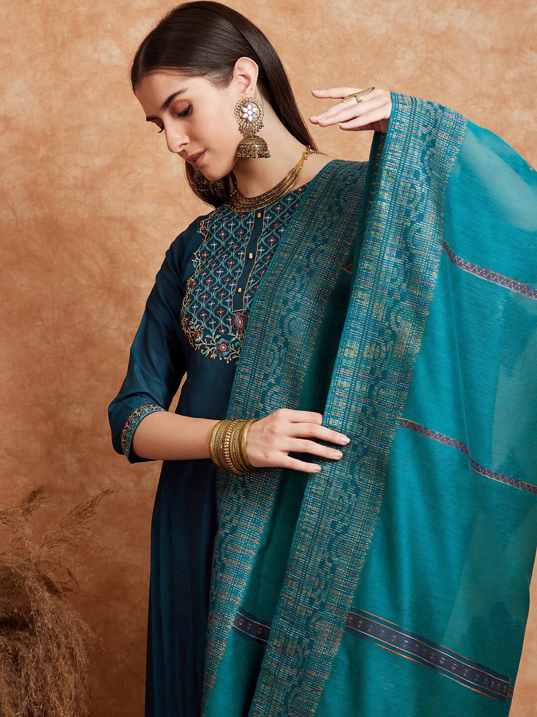 

Sangria Teal Blue Embroidered Zari Sequence A Line Kurta & Trousers Dupatta