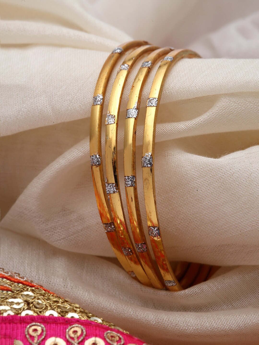 

Sanjog Set of 4 Gold & Silver-Toned Dual Toned Patterned Bangles