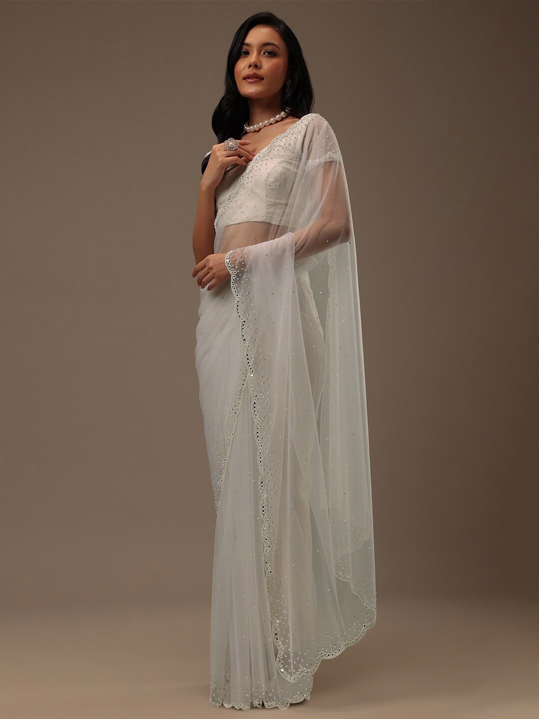 

KALKI Fashion Embellished Beads and Stones Net Heavy Work Saree, White