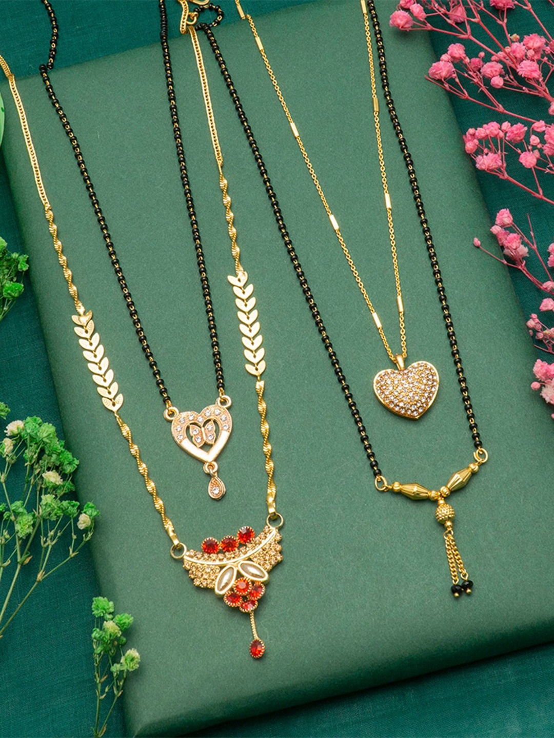 

Ramdev Art Fashion Jwellery Set Of 4 Gold Plated Gold Mangalsutra