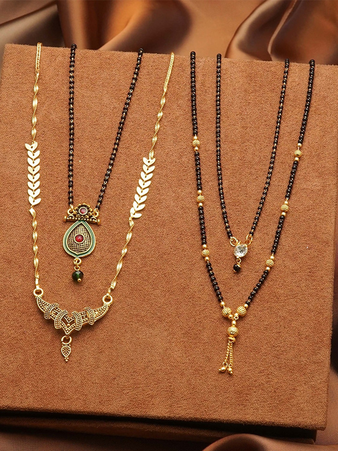 

Ramdev Art Fashion Jwellery Set Of 4 Gold-Plated Beaded & Stone Studded Mangalsutras