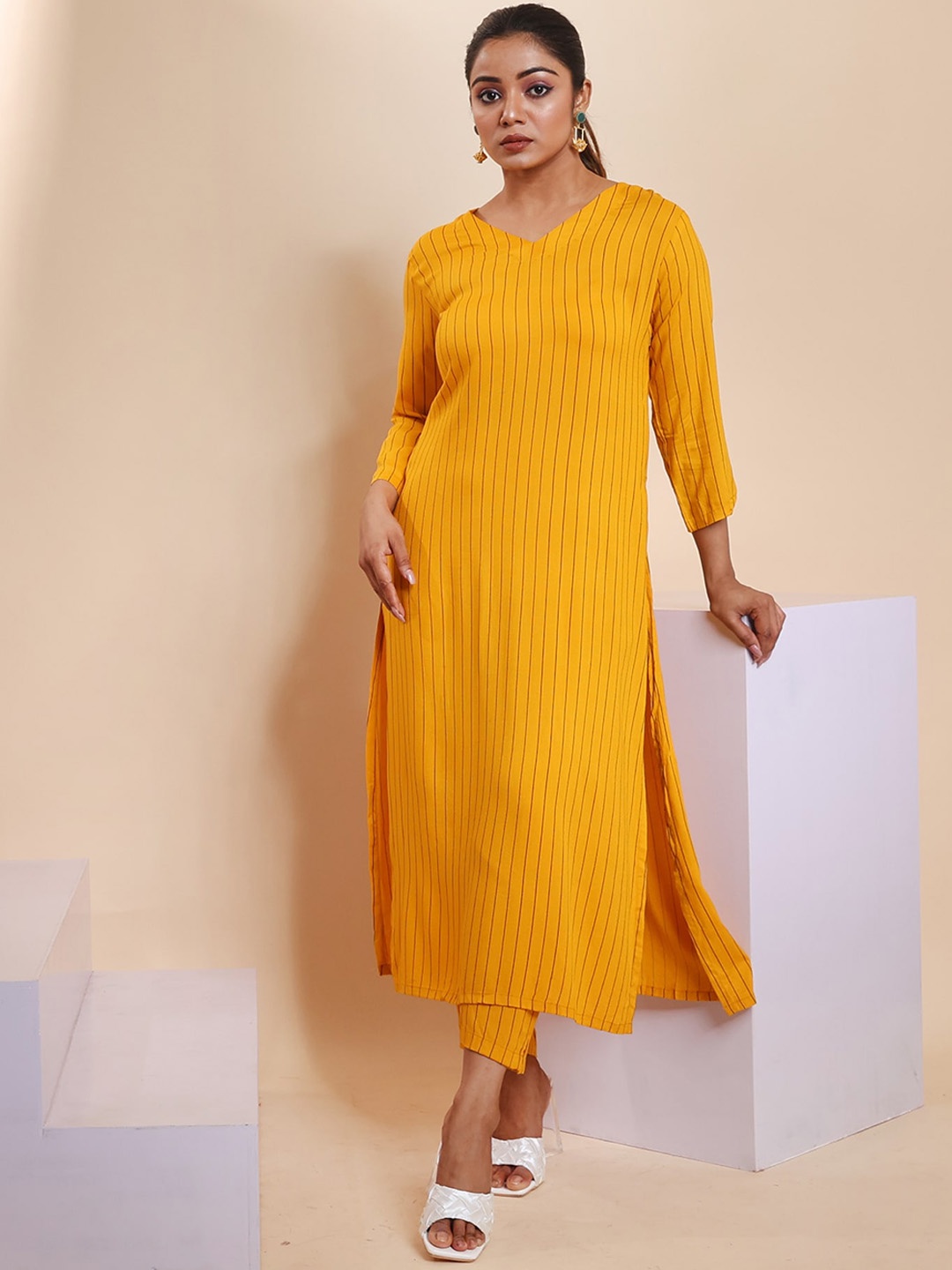 

Disli Striped V-Neck Pure Cotton A-line Kurta with Trousers, Yellow