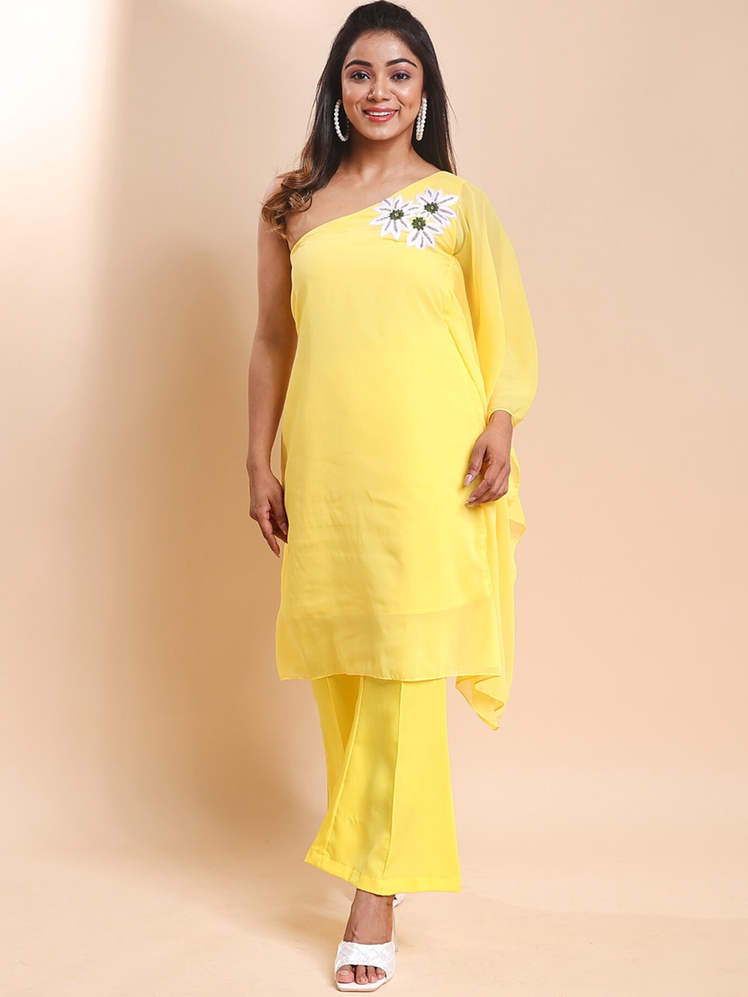 

Disli Floral Embroidered One Shoulder Georgette A-Line Kurta With Palazzos, Yellow