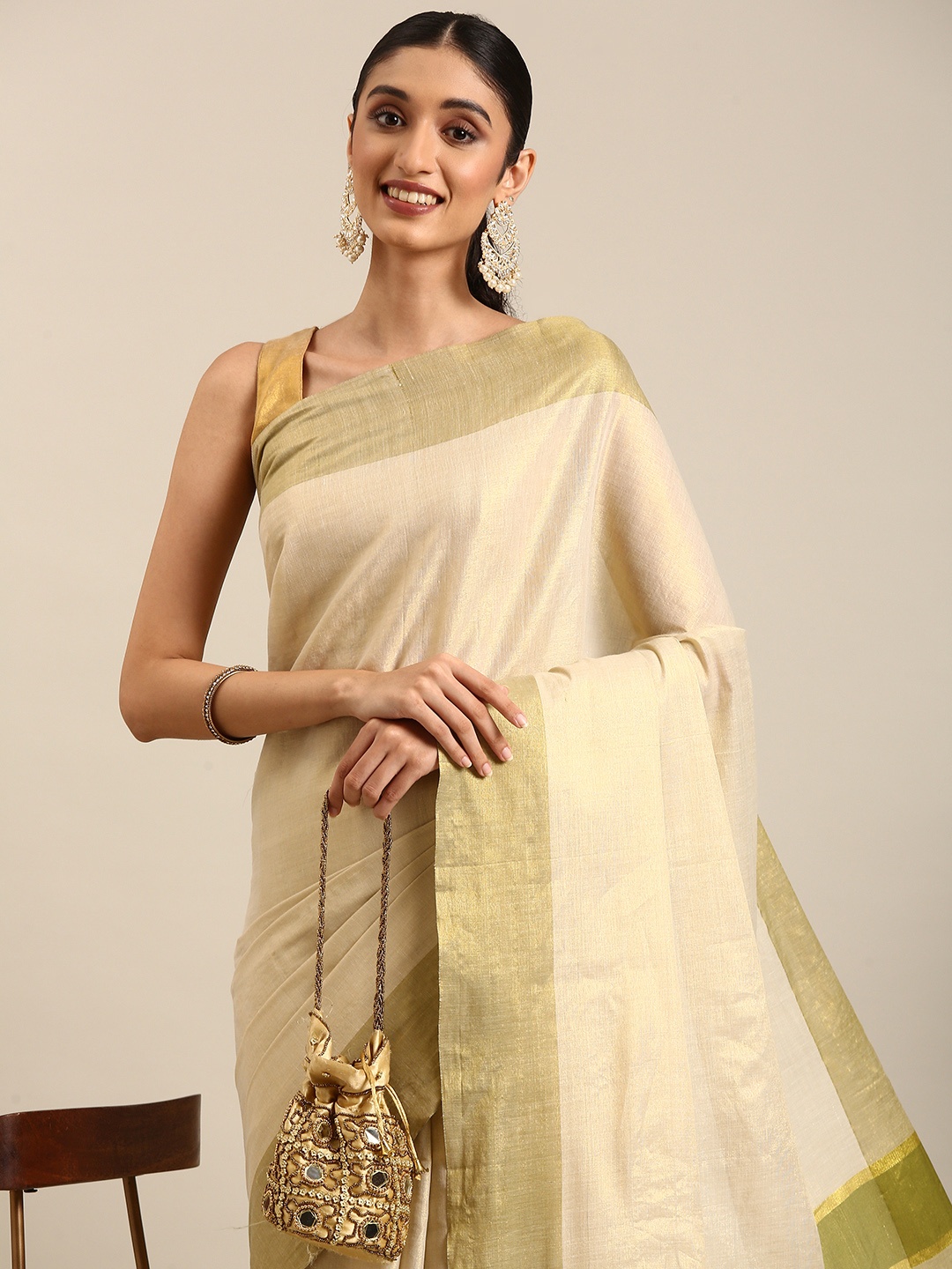 

Thara Sarees Solid Zari Tissue Kasavu Saree, Gold