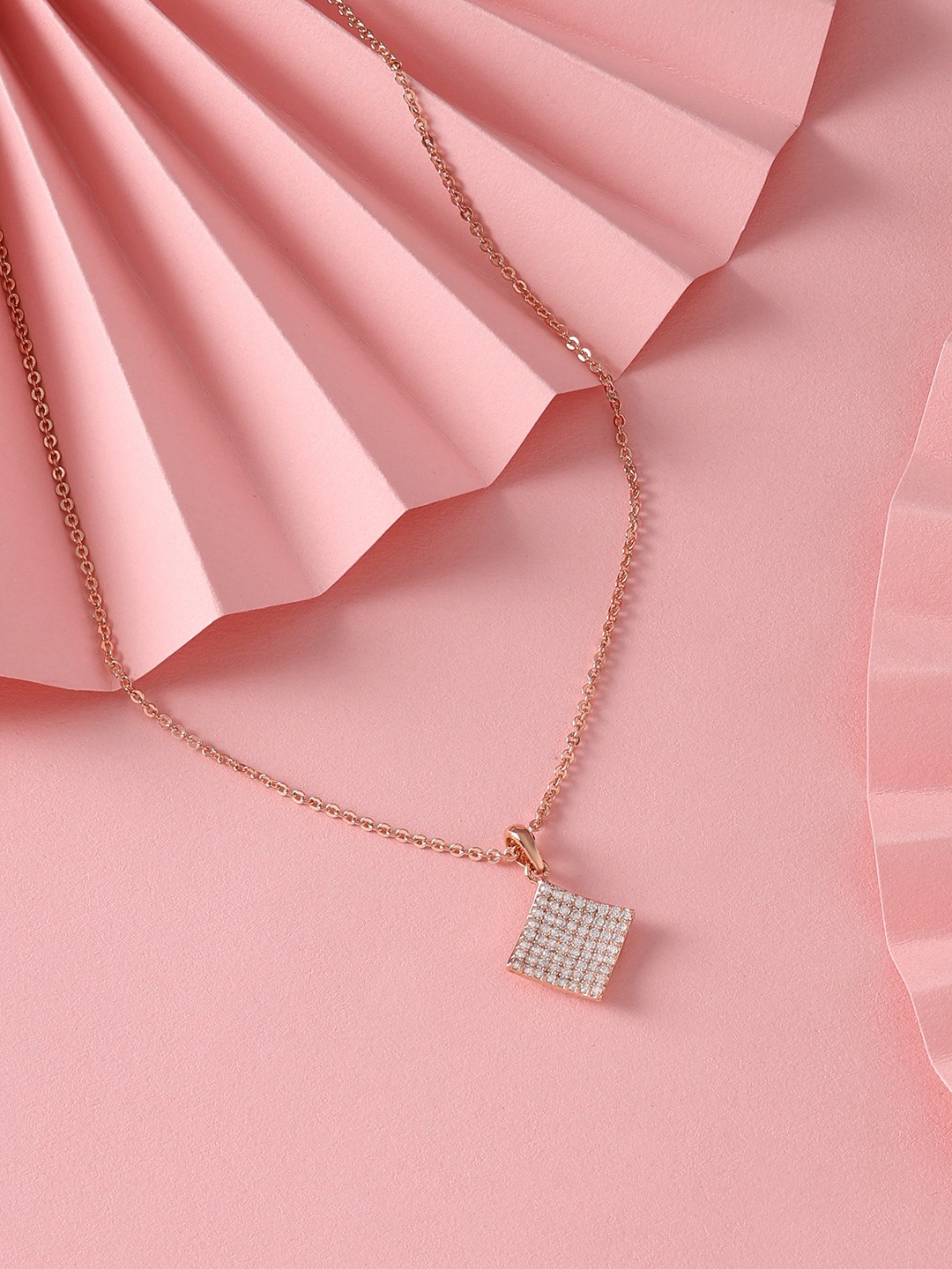 

Zaveri Pearls Rose Gold Plated Cubic Zirconia Stone Studded Pendant With Chain