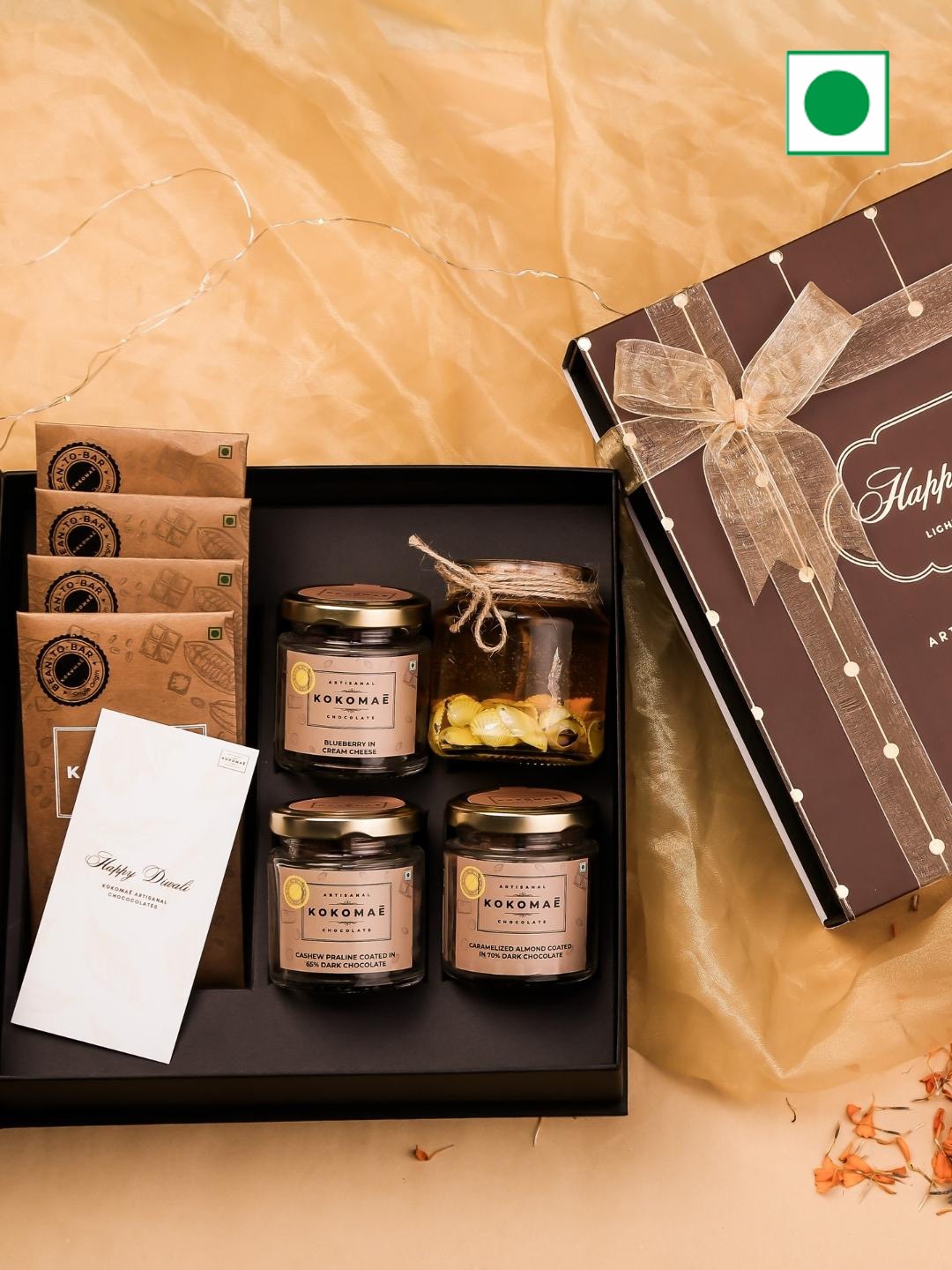 

Kokomae Artisanal Chocolate Golden Glow Diwali Hamper Bars with Dragees and an Offerings, Brown