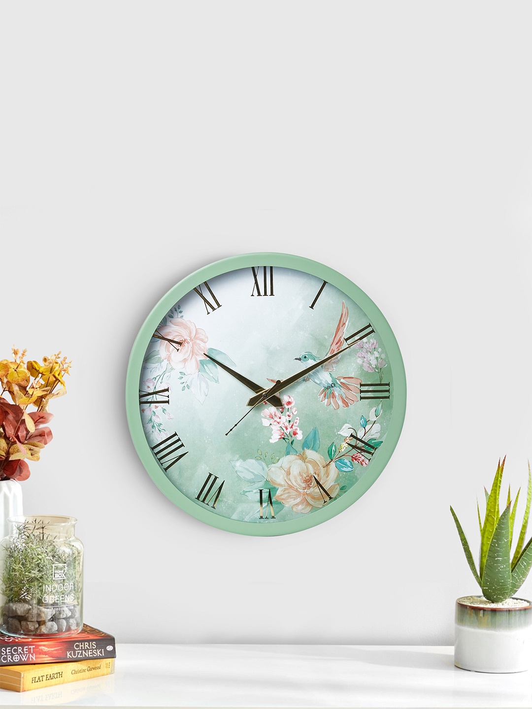 

Home Centre Moksha Divine Green & White Printed Contemporary Wall Clock