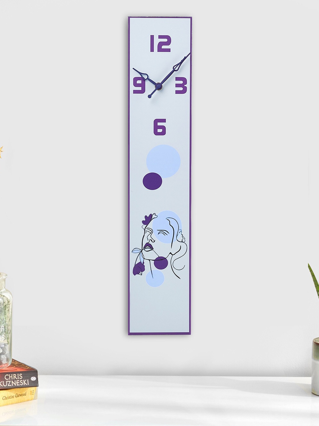 

Home Centre Lets Garden Riviera Purple & White Printed Contemporary Wall Clock