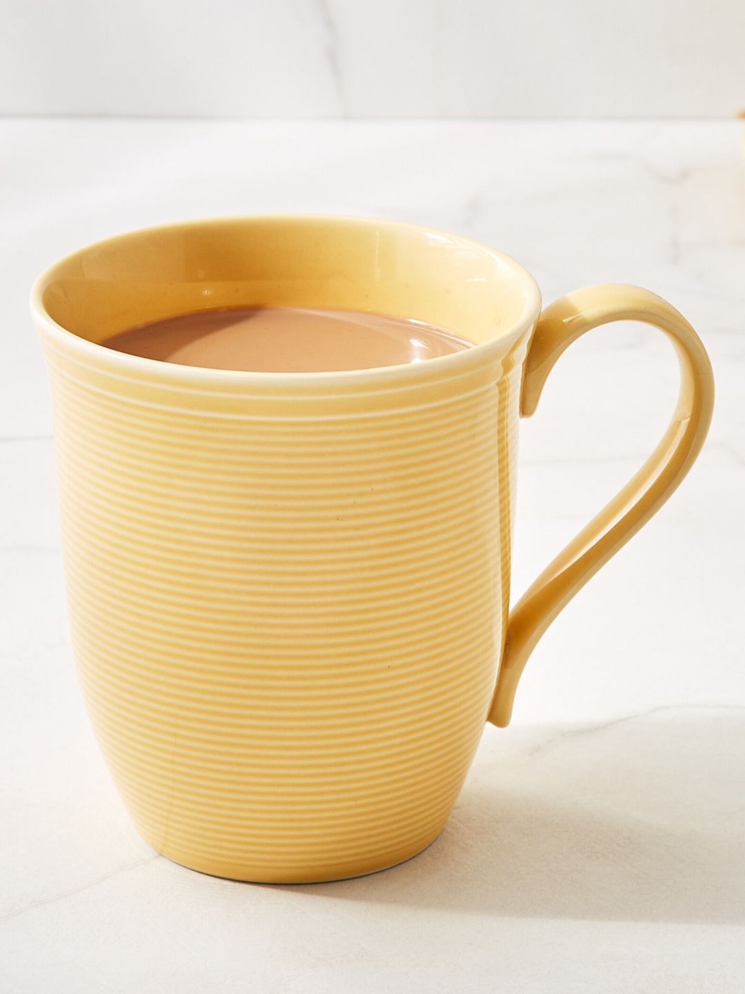 

Home Centre Colour Refresh Yellow Striped Porcelain Glossy Mug - 350 ML