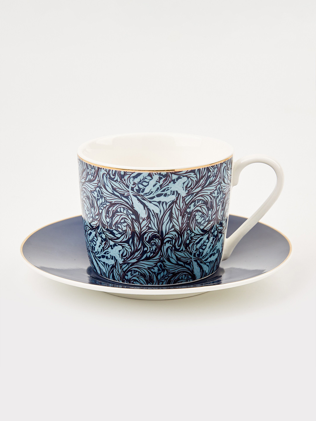 

Home Centre Feslix Morris 2 Pcs Blue & White Printed Porcelain Cup and Saucer - 180 ML