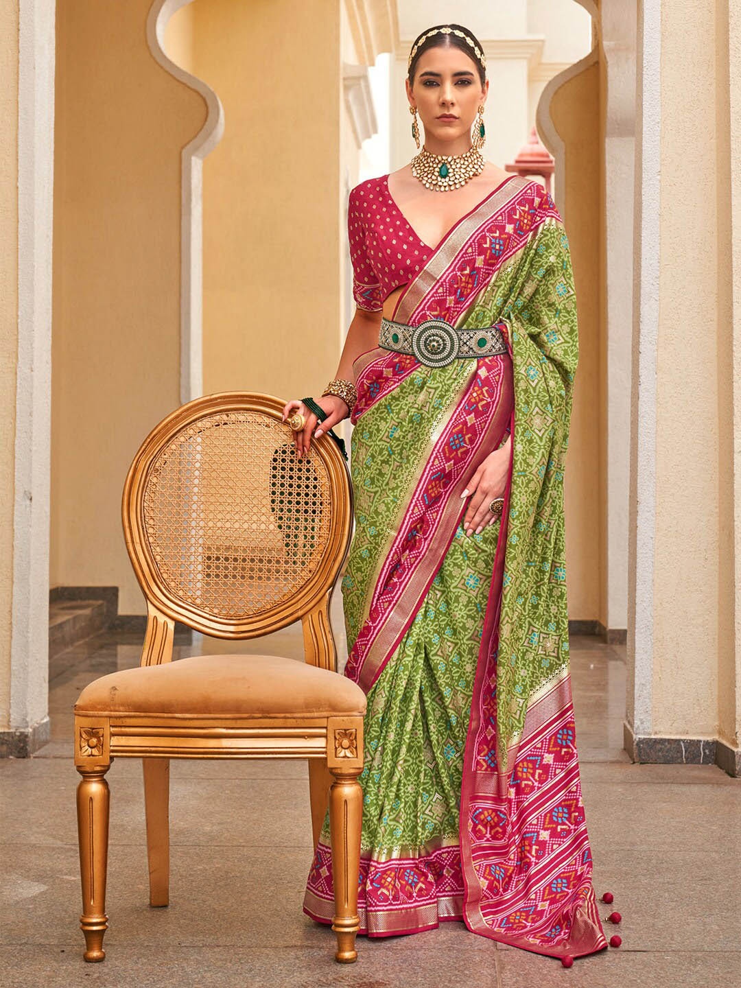 

Saree mall Green & Fuchsia Ethnic Motifs Prirnted Sarees