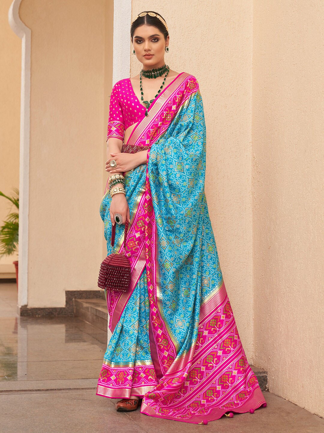 

Saree mall Blue Ethnic Motifs Printed Zari Detailed Patola Saree