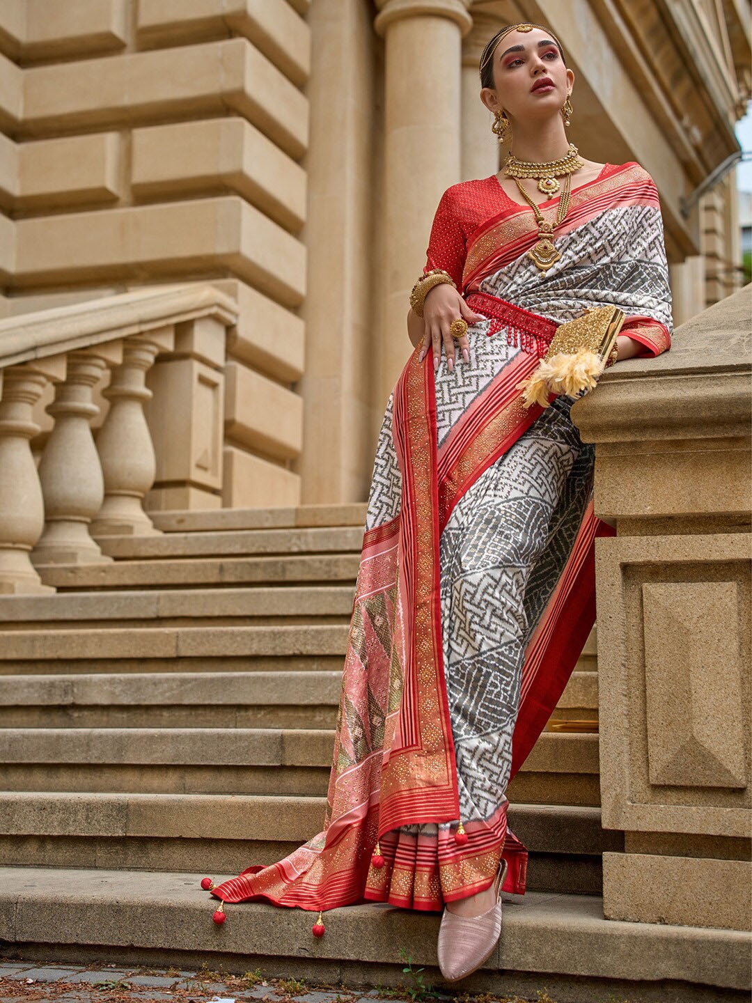 

Saree mall White Ethnic Motifs Printed Zari Detailed Patola Saree