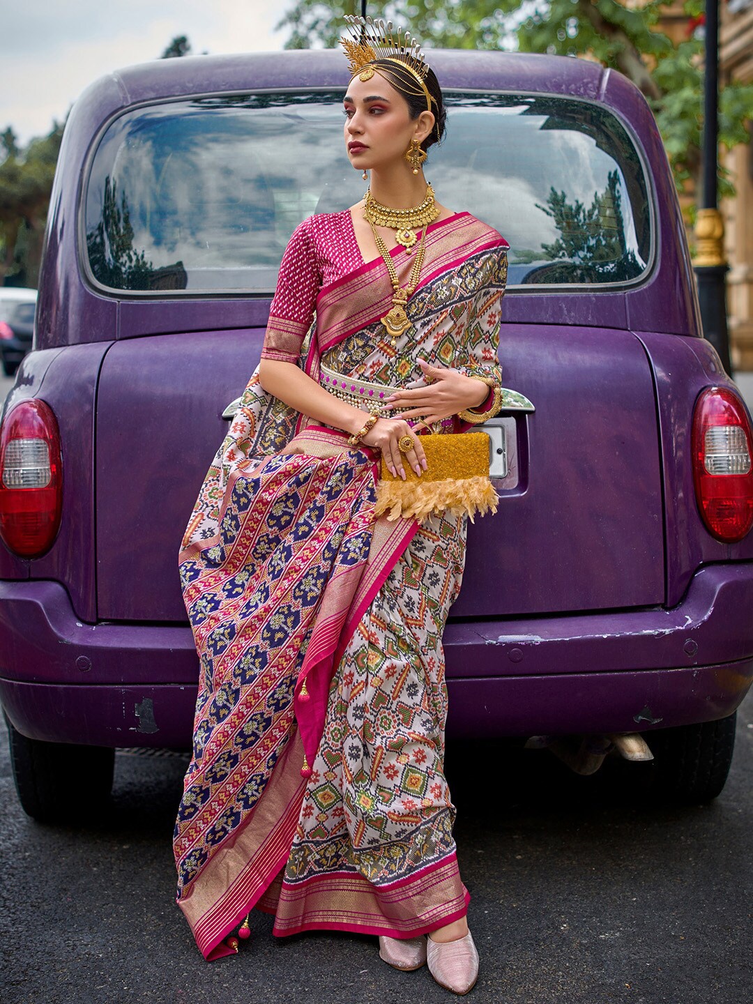 

Saree mall Off White Ethnic Motifs Printed Zari Detailed Patola Saree