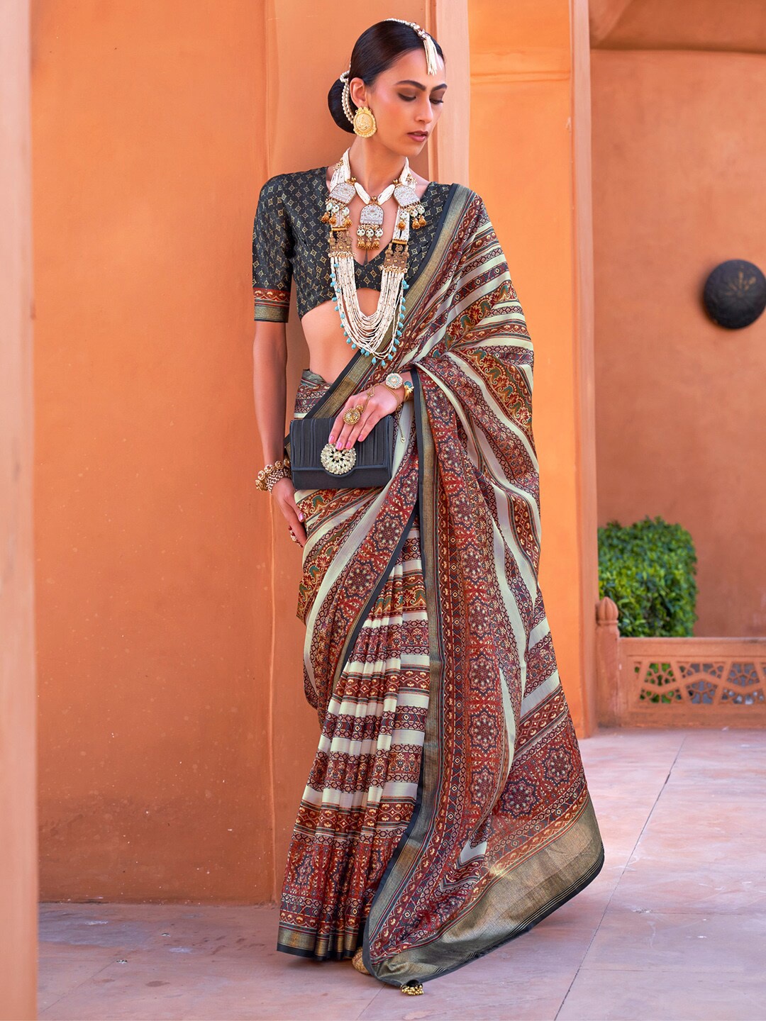 

Saree mall Ethnic Motifs Zari Silk Blend Banarasi Sarees, Maroon
