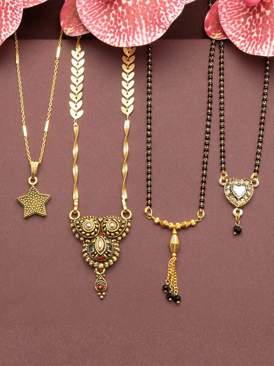 

Ramdev Art Fashion Jwellery Set Of 4 Gold-Plated Stone-Studded & Beaded Mangalsutra