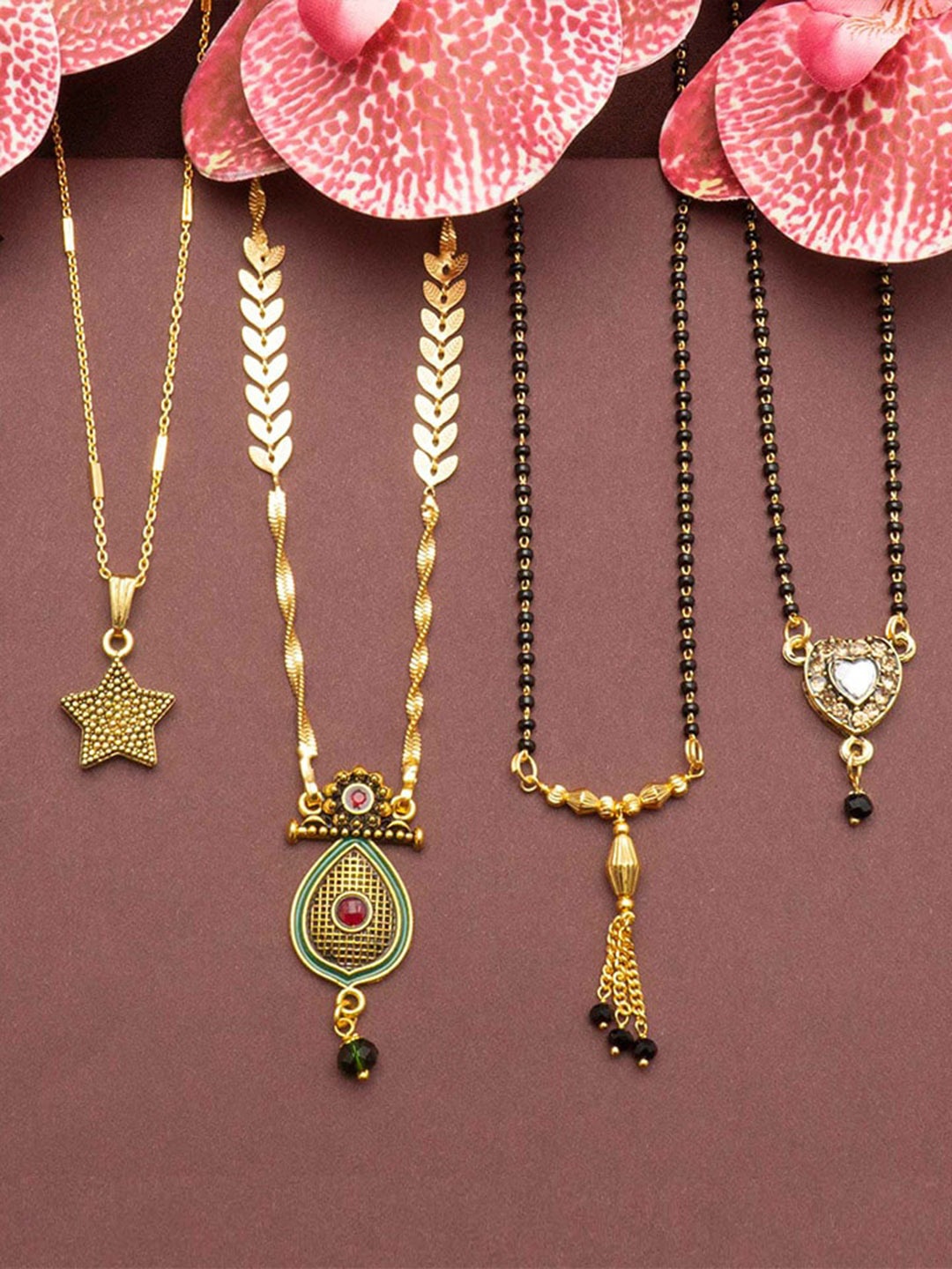 

Ramdev Art Fashion Jwellery Set Of 4 Gold Plated Stone-Studded & Beaded Mangalsutras