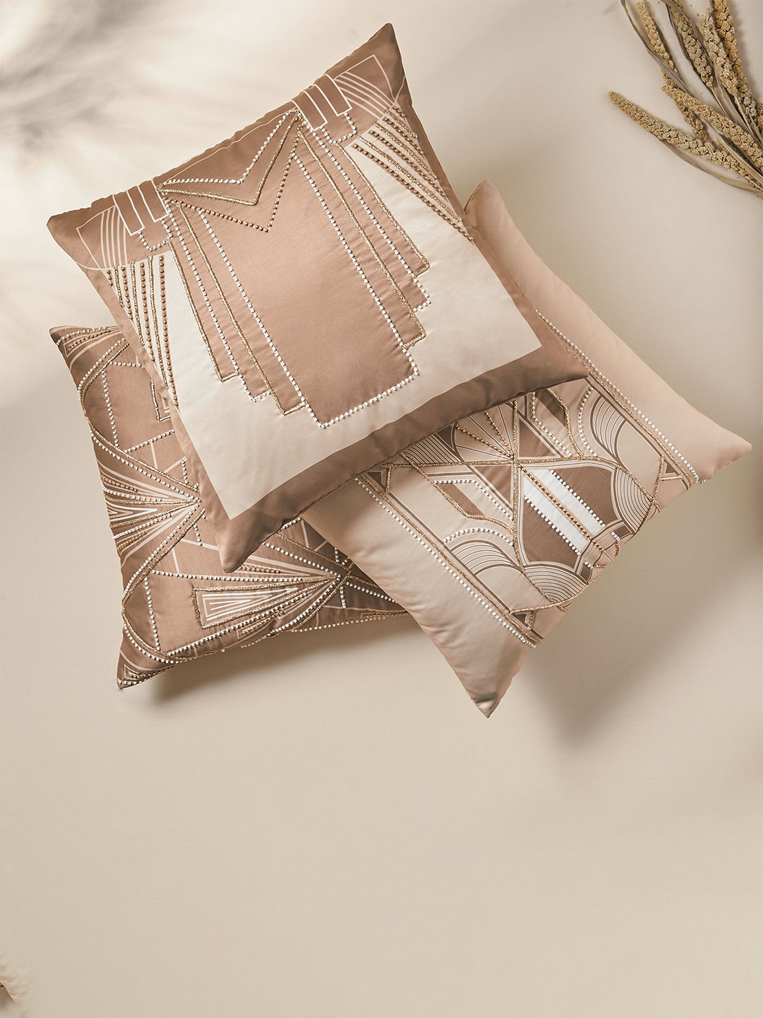 

Home Centre Lucent Riva Brown & White Geometric Embellished Square Cushion Cover