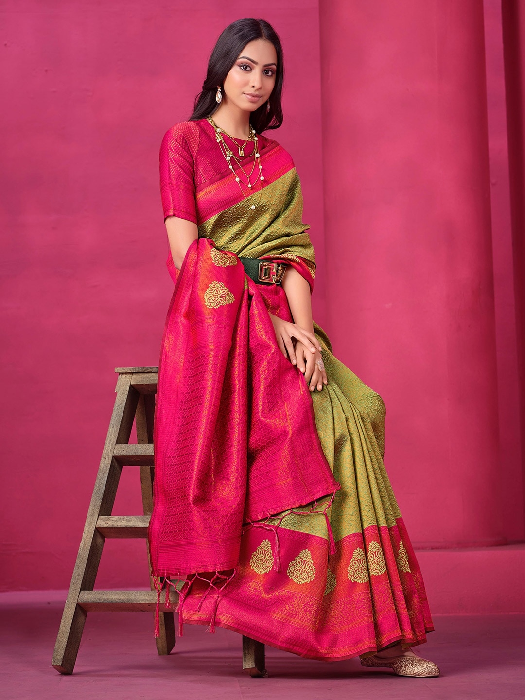 

Sangria Green Ethnic Motifs Woven Design Zari Detailed Saree
