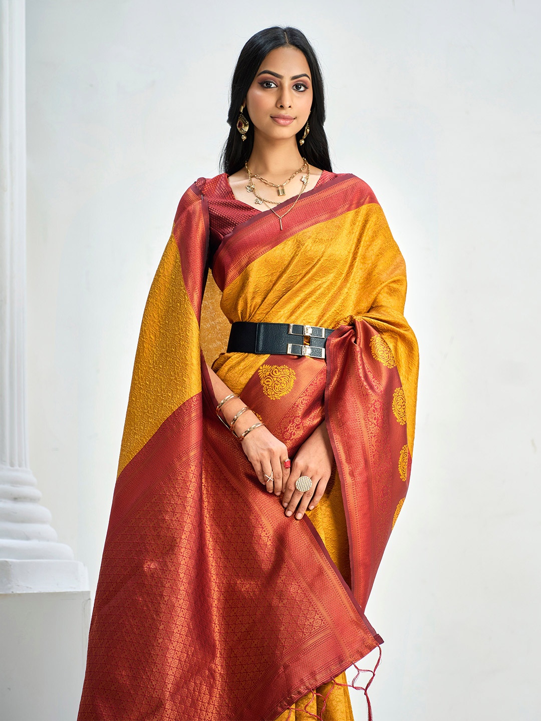 

Sangria Mustard Yellow Ethnic Motifs Woven Design Zari Detailed Saree