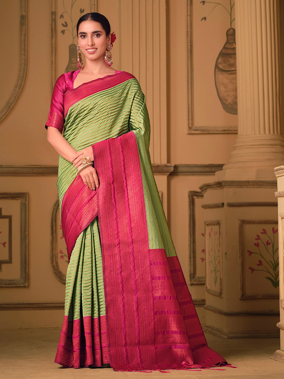 

Sangria Green Striped Zari Detailed Saree