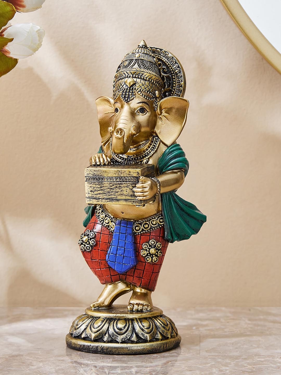 

Home Centre Red & Gold Toned Ganesha Showpiece