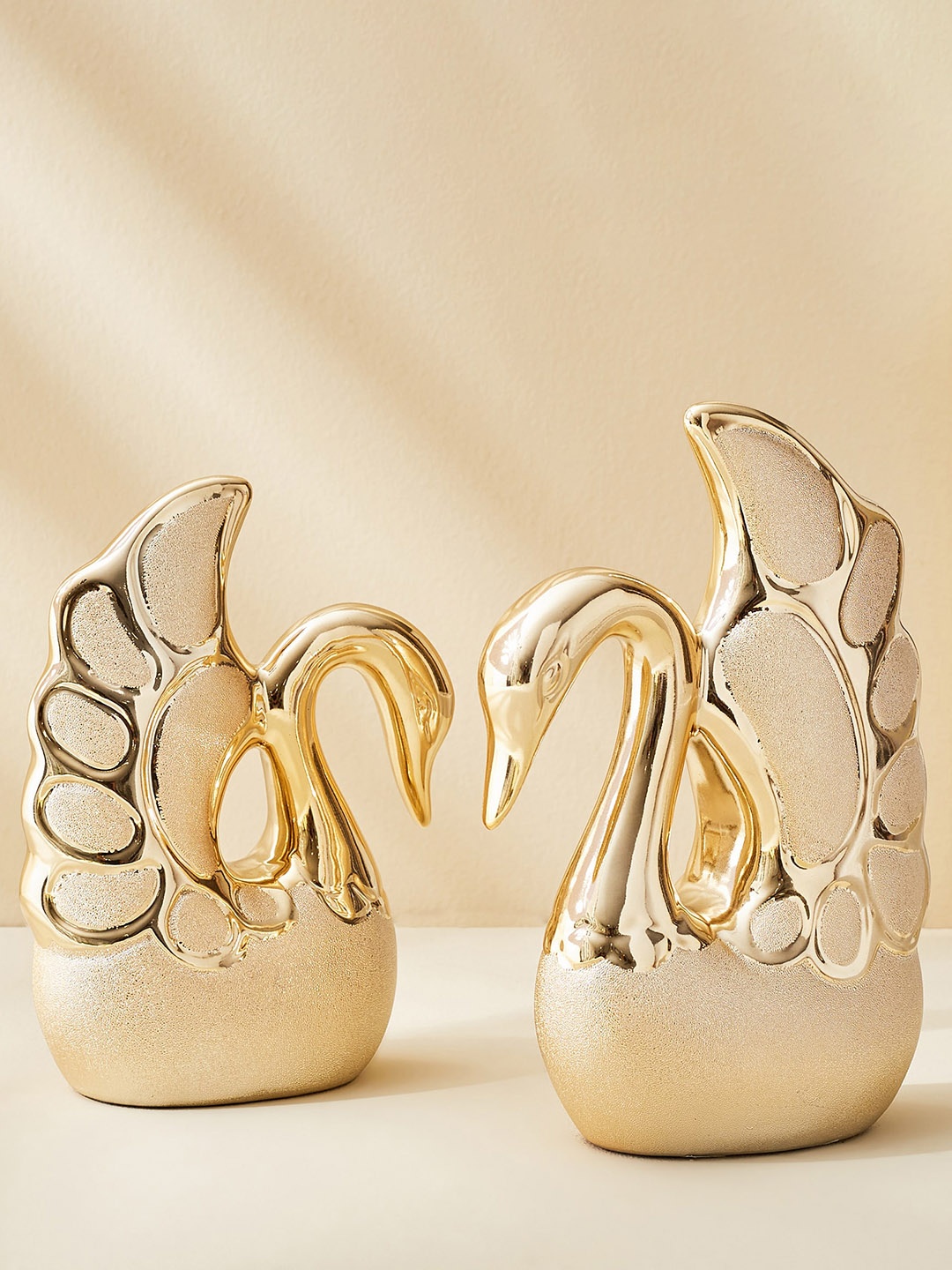 

Home Centre Gold Toned 2 Pieces Porcelain Swan Showpiece