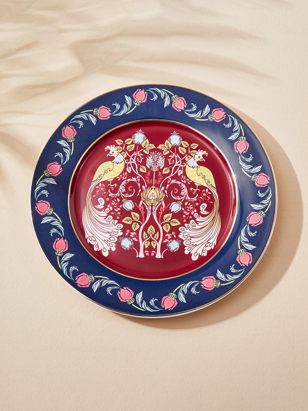 

Home Centre Feslix Morris Blue & Maroon Printed Porcelain Side Plate