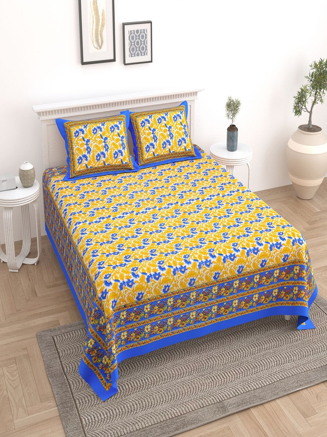 

UNIQCHOICE Blue & Yellow Floral Cotton 180 TC King Bedsheet With 2 Pillow Covers