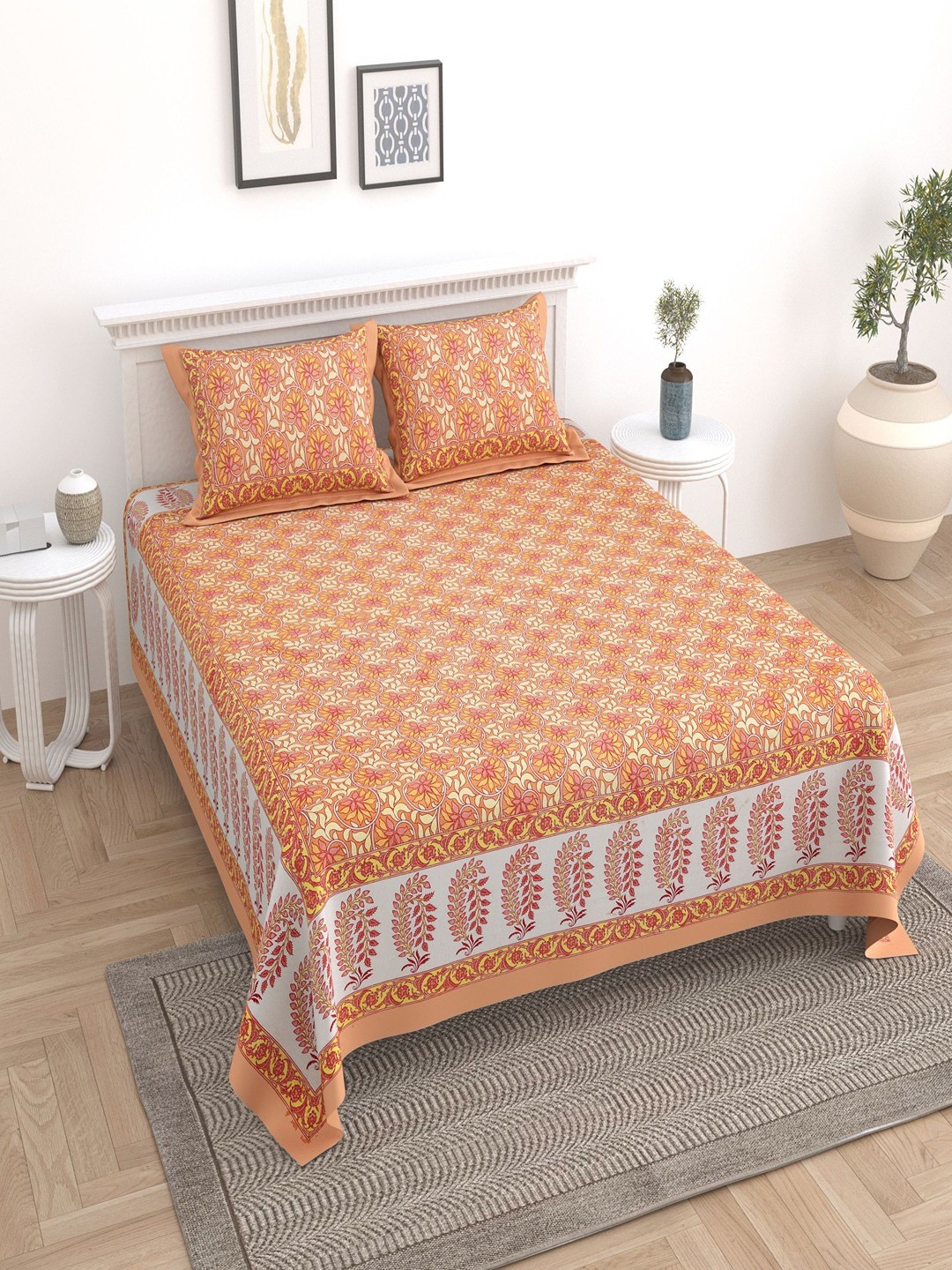 

UNIQCHOICE Orange & White Floral Cotton 180 TC King Bedsheet With 2 Pillow Covers