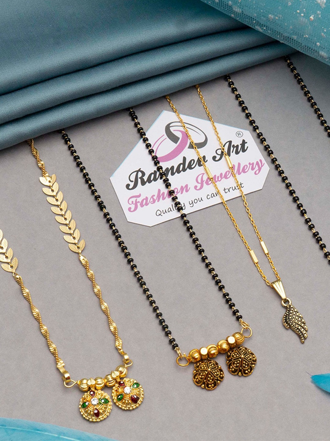 

Ramdev Art Fashion Jwellery Set of 4 Gold-Plated Mangalsutra
