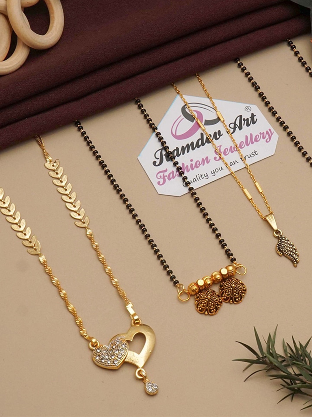 

Ramdev Art Fashion Jwellery Set Of 4 Gold Plated Stone Studded & Beaded Mangalsutras
