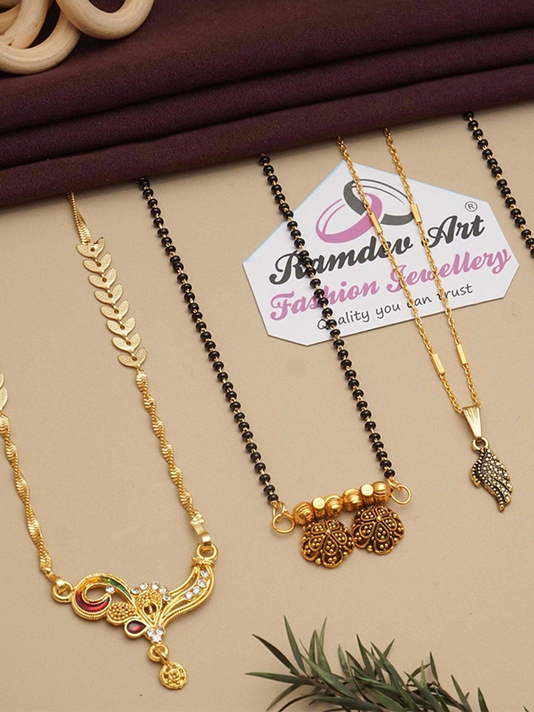 

Ramdev Art Fashion Jwellery Pack Of 4 Gold Plated Stone Studded & Beaded Mangalsutras