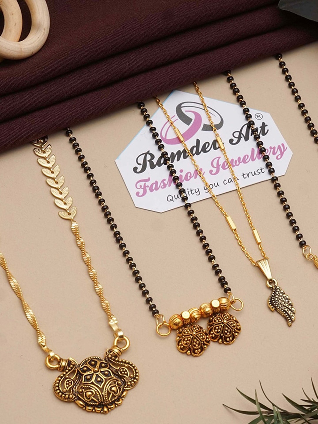 

Ramdev Art Fashion Jwellery Pack Of 4 Gold Plated Stone Studded & Beaded Mangalsutras